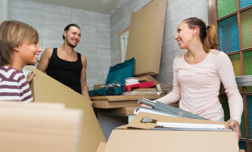 Large furniture being moved by professionals in Gerrards Cross