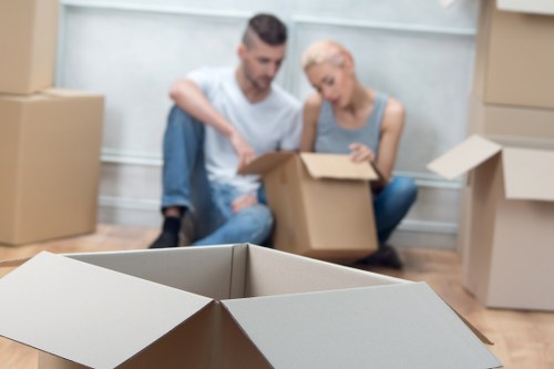Professional team handling bulky furniture