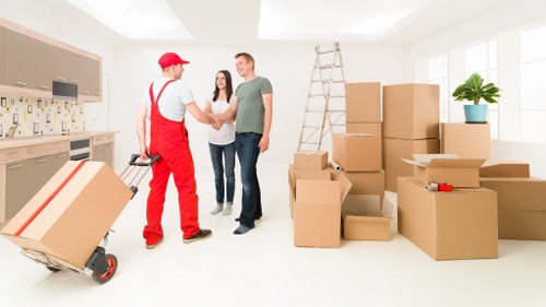Professional team removing bulky furniture