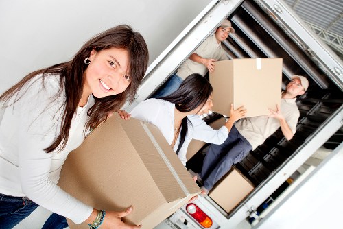 Professional team handling bulky items in Hertford